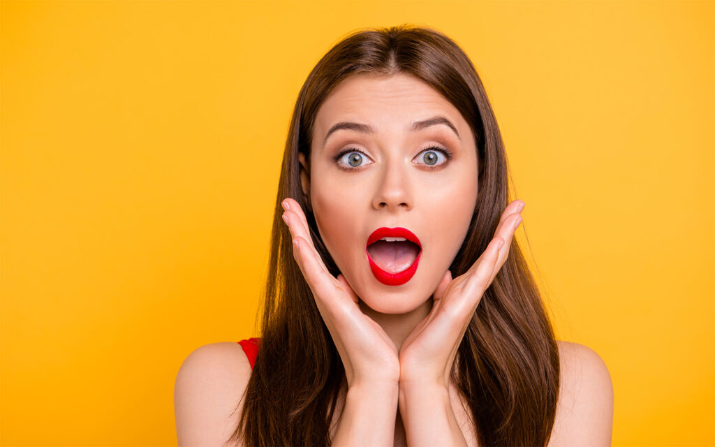 mouth shocked woman