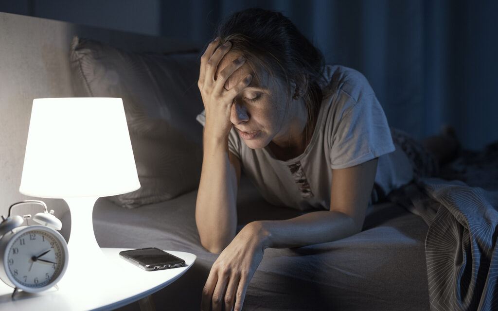 Tired woman waking up