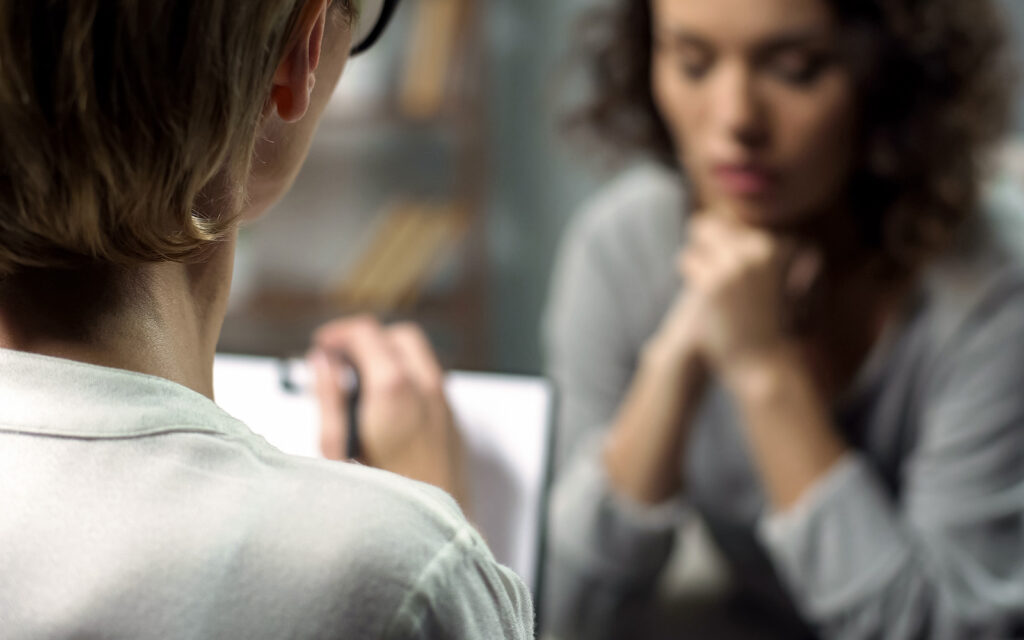 Doctor consulting a woman