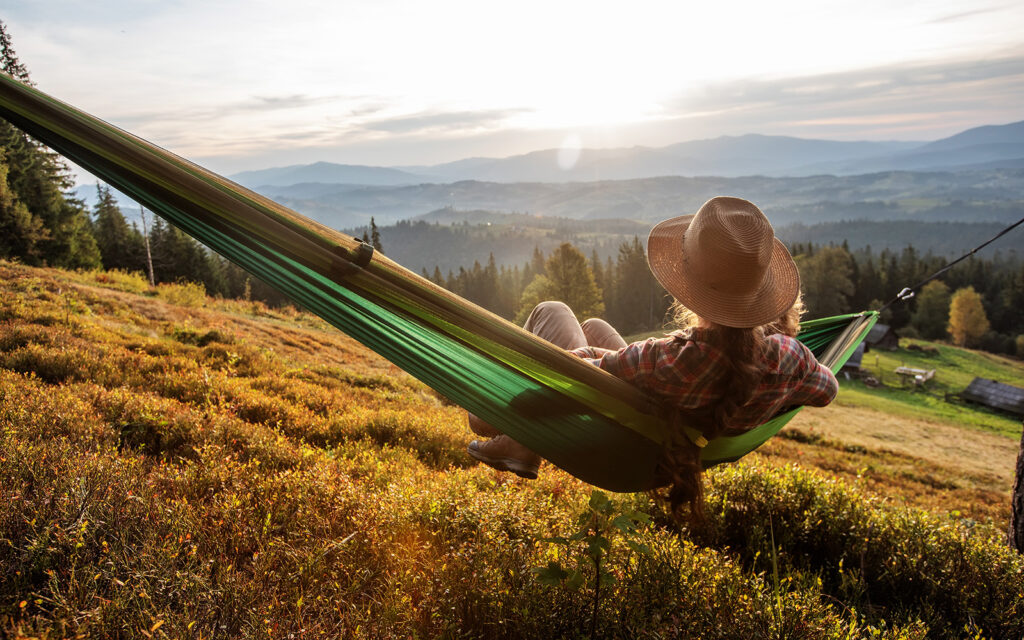 Woman relaxing on hammock